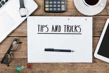 Tips, Tricks On Notebook On Office Desk With Computer Technology, High Angle