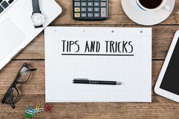 Wall Mural - tips, tricks on notebook on Office desk with computer technology, high angle