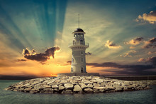 Lighthouse On The Sea Under Sky.