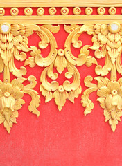 Wall Mural - Traditional Thai style flower pattern decorative, stucco gold paint in temple,Thailand.