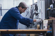 © click_and_photo - Craftman working with bike details
