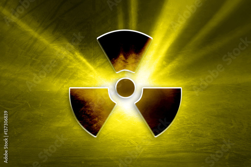 Fotografía Conceptual dark grunge radioactive symbol on the textured yellow colored illustration background