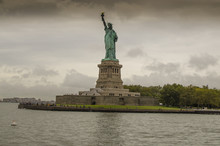 New York City View Of The Statue Of Liberty In A Bad Weather Day