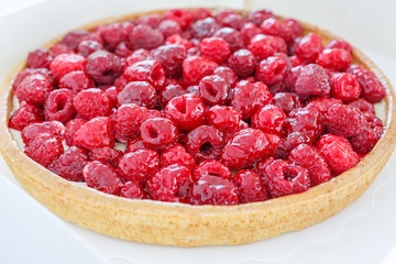 background cake with berry raspberry jelly. pink, red background