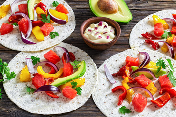 Wall Mural - delicious healthy fajitas with chunks of smoked salmon