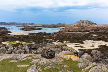 Wall Mural - Lobster pot and rocky coast Fidden beach Isle of Mull Scotland uk Inner Hebrides near to Iona and Fionnphort