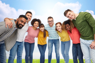 Wall Mural - international group of happy people hugging