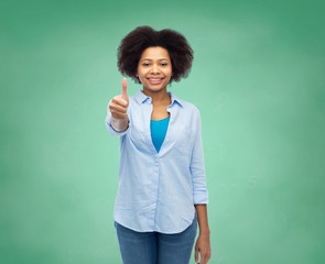 Poster - happy afro american woman showing thumbs up