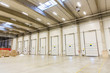 © Syda Productions - warehouse doors or gates and cargo boxes