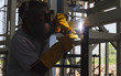 © Freely - Welders were welding steel structural by arc welding, Steel fabrication industry.