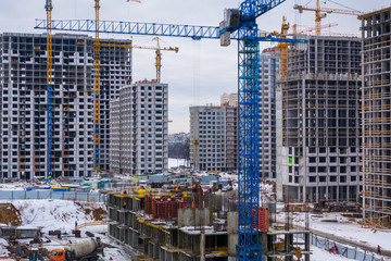 A large construction site with a lot of houses under construction