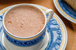 Traditional mexican hot chocolate cup with cinnamon