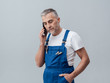 © stokkete - Repairman on the phone