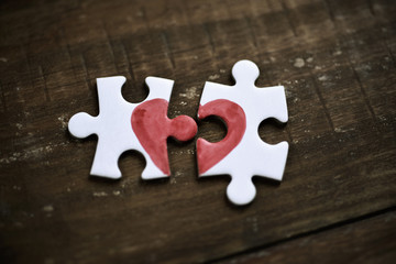 Sticker - puzzle pieces which form a heart