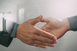 © everythingpossible - Business partnership meeting concept.photo businessmans handshake. Successful businessmen handshaking after perfect deal.close up