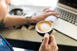 © AntonioDiaz - POV of a man drinking coffee and working