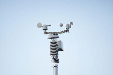 weather station on blue sky background