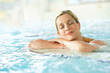 © goodluz - Beautiful blond woman relaxing in thalassotherapy thermal water