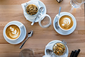 Breakfast for two, coffee and granola top view