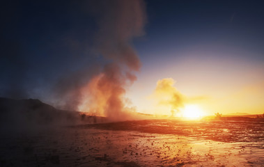 Wall Mural - Fantastic sunset Strokkur geyser eruption in Iceland