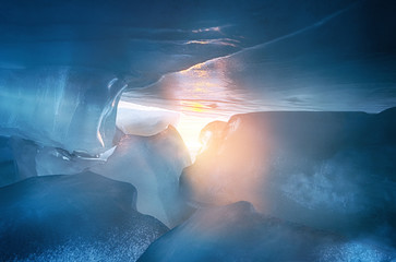 The view from the cave with icicles, shards of ice and incrustations.