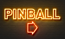 Pinball Neon Sign On Brick Wall Background.