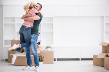 Wall Mural - happy Young couple moving in new house