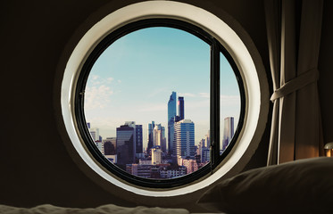 Poster - 
 Save
Download Preview
Circle windows with modern buildings in the city at morning