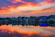 © fabio lamanna - Colorful sky and clouds over Pushkar, Rajasthan, India. Temples, buildings and colors reflecting on the holy water of the lake at sunset.