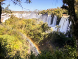 Fototapeta  - View of the Iguazu (Iguacu) falls, the largest series of waterfalls on the planet, located between Brazil, Argentina, and Paraguay. 