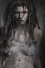 Dirty Zombie Woman With Clay Make Up On Dark Background