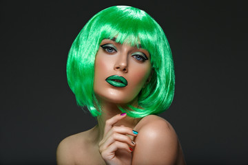 Wall Mural - Beautiful girl in green wig