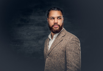 Wall Mural -  Black male dressed in a suit from a wool.