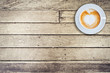 Top view coffee mug on wood background with space.