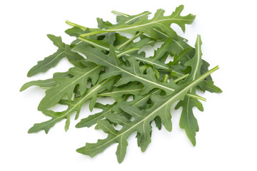 Wall Mural - Close up studio shot of green fresh rucola isolated on white background.