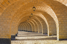 The Arched Stone Colonnade With Lanterns