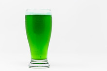 Pilsner Glass With Green Beer Isolated On White Background.
