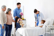 © Africa Studio - Family visiting little girl in hospital