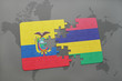 puzzle with the national flag of ecuador and mauritius on a world map