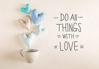 do all things with love message with blue heart cushions