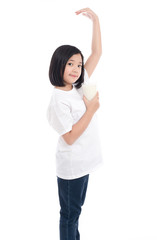 Wall Mural - Asian girl holding glass of milk on white background