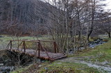 Fototapeta Na ścianę - Mountain landscape with  river and interesting wooden bridge in forest, Vitosha mountain, Bulgaria  