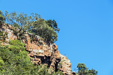  Surface Of Mountains Cliff Face Against Blue Sky