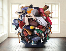 Big Heap Of Different Clothes And Shoes