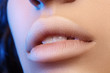 © marinafrost - Closeup perfect natural lip makeup. Beautiful plump full lips on female face. Clean skin, fresh make-up. Spa tender lips