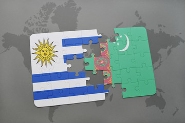 puzzle with the national flag of uruguay and turkmenistan on a world map