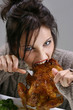 Girl is eating chicken, gluttony