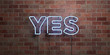 YES - fluorescent Neon tube Sign on brickwork - Front view - 3D rendered royalty free stock picture. Can be used for online banner ads and direct mailers..