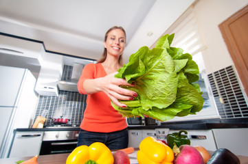 Wall Mural - young woman making healthy food