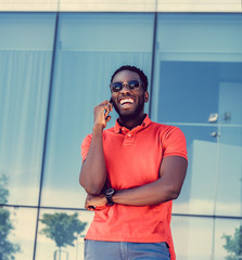 Wall Mural - Smiling Black male dressed in a red polo shirt.